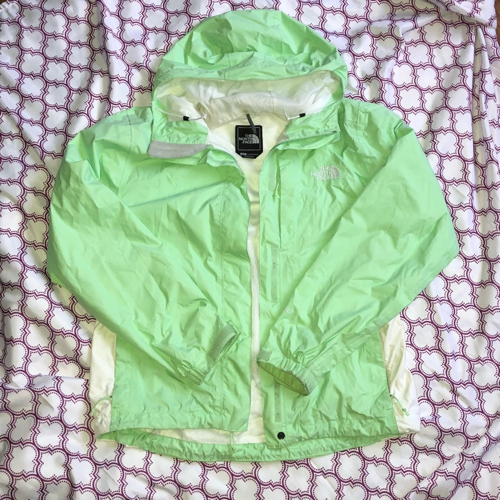 mint green northface rain jacket